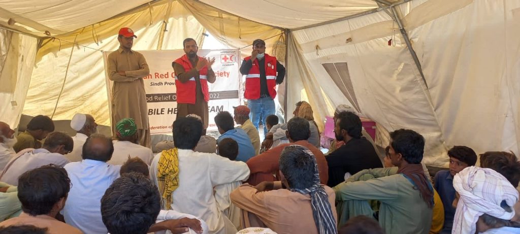 Community attending PRCS hygiene awareness session in flood-affected district of Dadu