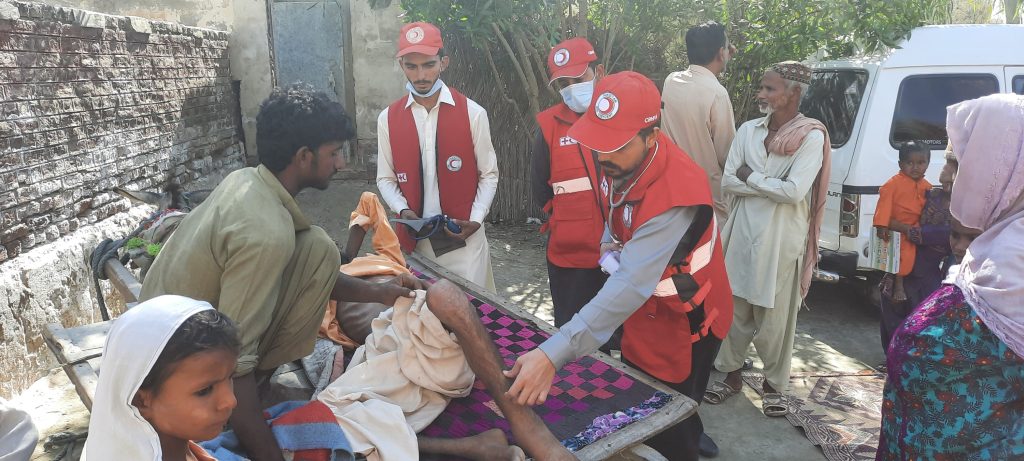 PRCS health team providing malaria treatment in flood-affected village of Dadu, Sindh
