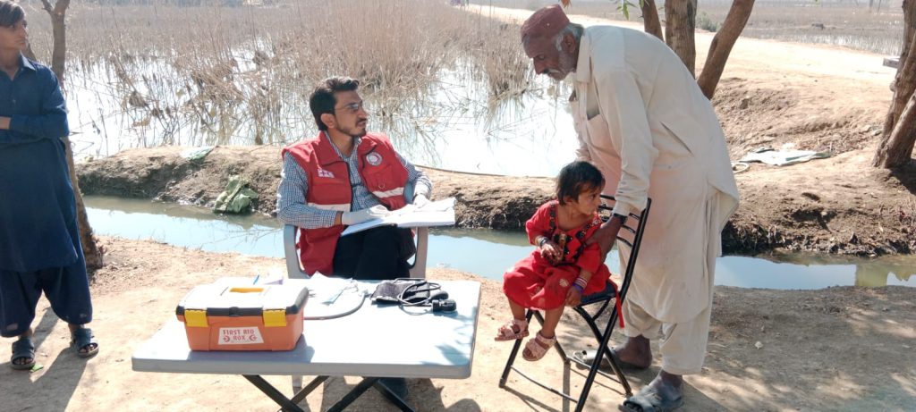 PRCS doctors distributing free medicines during malaria outbreak response in Sindh