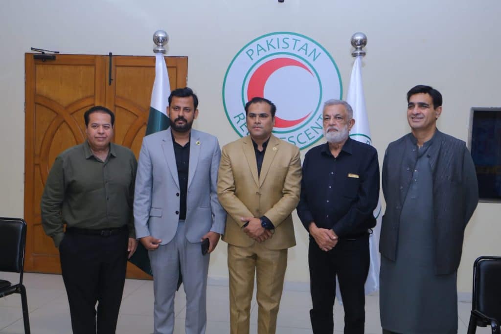 Rehan Hashmi leading PRCS community engagement session with Pakistan Excellence Club in Karachi.