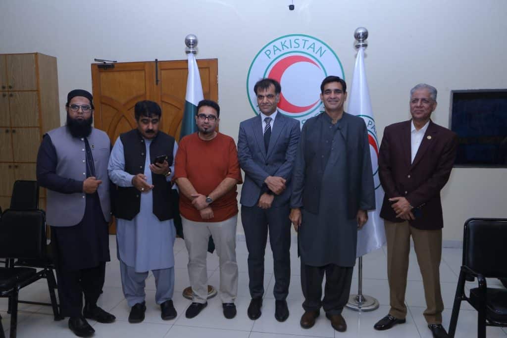 Rehan Hashmi leading PRCS community engagement session with Pakistan Excellence Club in Karachi.