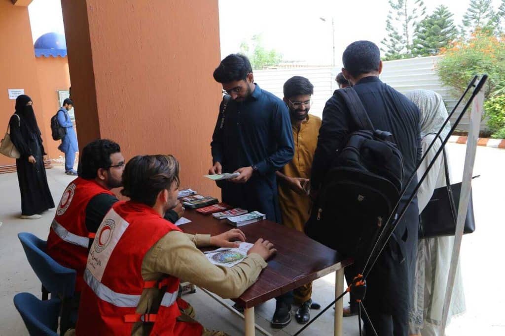 Participants and guests at the Green Tech for Climate-Resilient Pakistan event organized by PRCS Sindh and Bahria University under the CACRA Project.