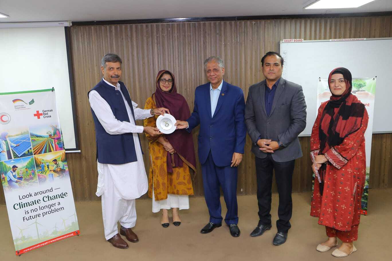 Chairman Rehan Hashmi and Provincial Secretary Kanwar Waseem discussing PRCS Sindh climate initiatives during Green Tech for Climate-Resilient Pakistan event