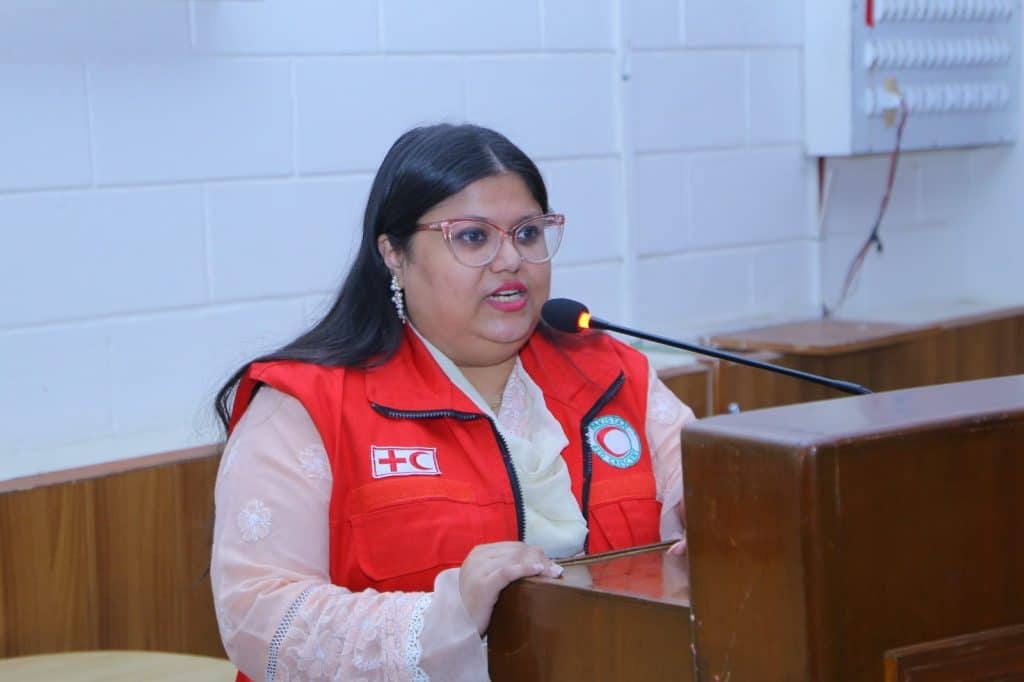 Speakers presenting on health impacts of climate change at JMDC auditorium