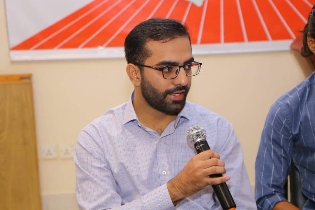 Volunteers engaging in team-building exercises to strengthen collaboration and teamwork during PRCS Sindh’s health orientation session.