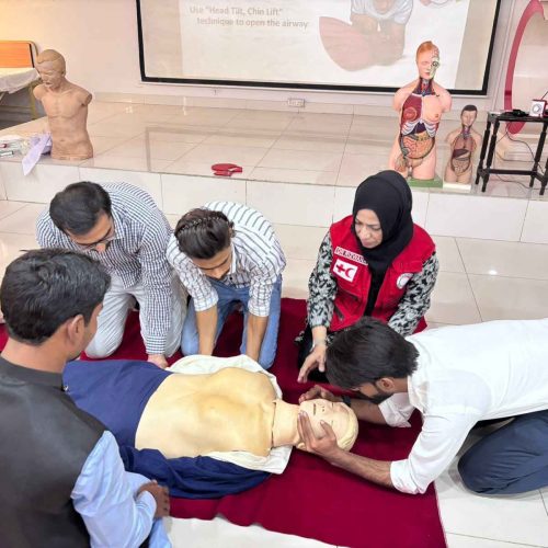 PRC Sindh trainers demonstrating first aid techniques during training session