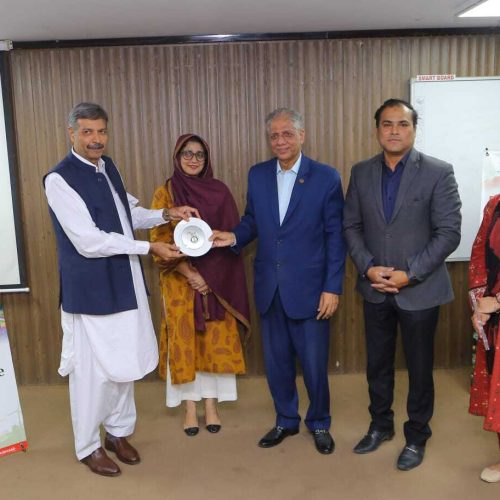 Chairman Rehan Hashmi and Provincial Secretary Kanwar Waseem discussing PRCS Sindh climate initiatives during Green Tech for Climate-Resilient Pakistan event